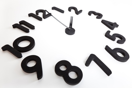 The clock on a gray backgroundの写真素材