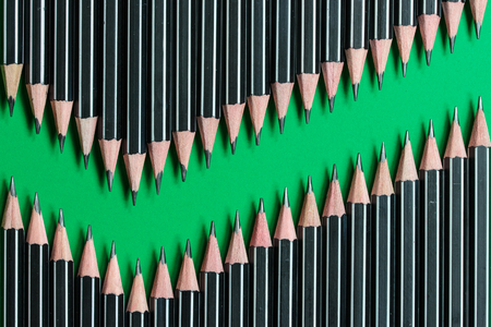 create pencil checkmark on green paperの写真素材