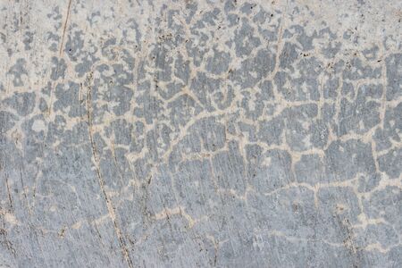 Closeup of cracked concrete texture for background