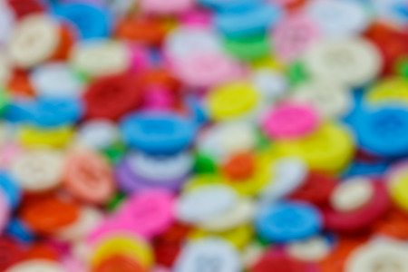 Blurry image of colorful sewing buttons (clasper)の写真素材