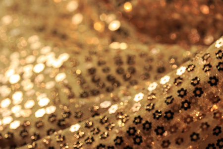 Blurry image of gold abstract backgroundの写真素材