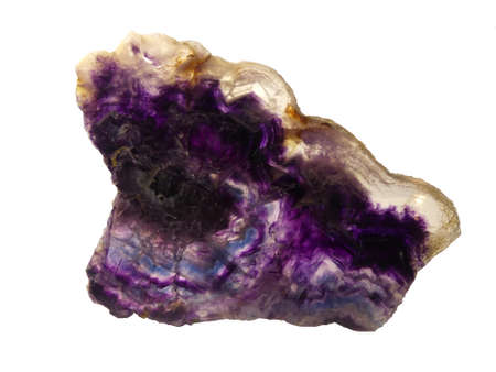 Specimen of natural mineral. White, blue and purple fluorite. Crystal translucent stone isolated on...