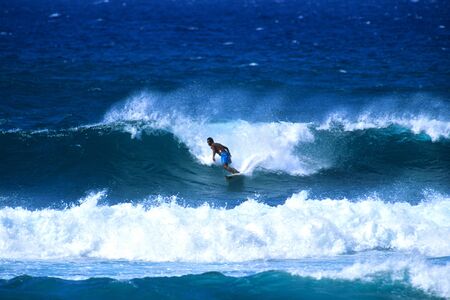 Surfer on Big Wave