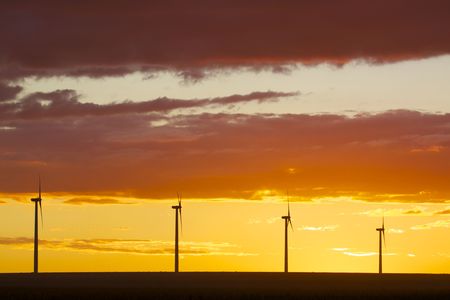 Wind Turbines in Sunsetの写真素材