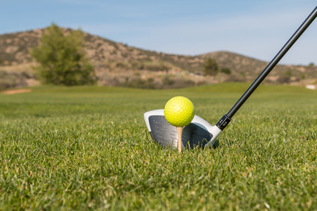 Driver and Golf Ball on Teeの写真素材