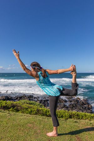 Practicing Yoga on the Maui Coastの写真素材