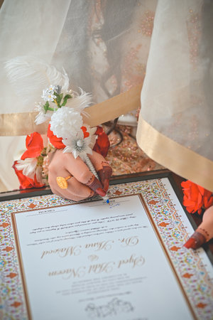 wedding ceremony, bride  signing a wedding contractの写真素材