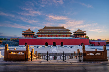 Morning sunlight illuminates the majestic Meridian Gate and Taihe Gate in the Forbidden City, Beijing, China.の写真素材