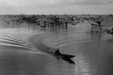 Fisher view to commercial  use big fishnet in lake.の写真素材