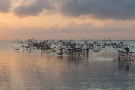 Fisher view to commercial  use big fishnet in lake.の写真素材