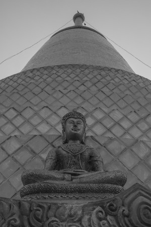 Temple have gray buddha statue.の写真素材