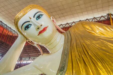 Buddhist monks to sleep sweet eyes or the butterfish is reclining Buddha Chau Yee Tat in Temple,...