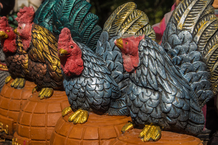 Chickens statue at temple in Thailand.の写真素材