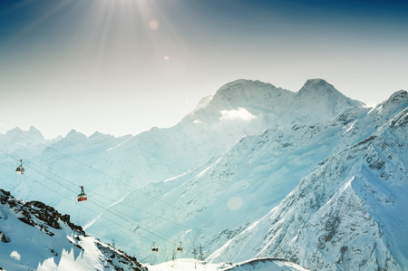 Winter mountains at sunny day. Ski resort Elbrus, Caucasus, Russian Federation. Beautiful winter landscapeの写真素材