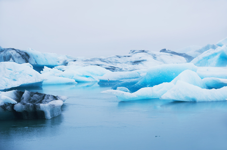 Beautiful blue icebergs in Jokulsarlon glacial lagoon. Vatnajokull glacier, south of Icelandの写真素材