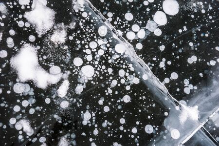Beautiful natural ice on the lake. Winter backgroundの写真素材