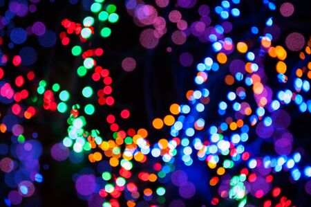 Shiny background with colorful lights and bokehの写真素材