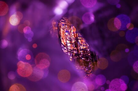 Winter abstract background with colorful ice and bokehの写真素材