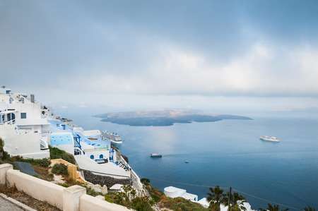 White architecture on Santorini island, Greece.  Beautiful landscape with sea view. Foggy morning.の写真素材