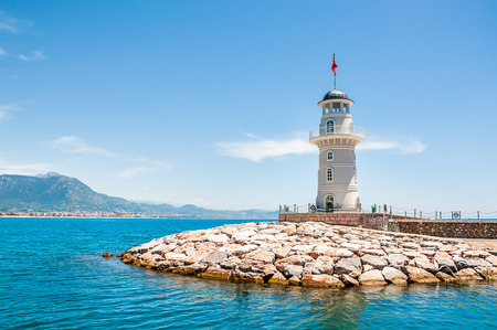 Lighthouse in the port of Alanya, Turkey. Beautiful summer landscape with sea beachの写真素材