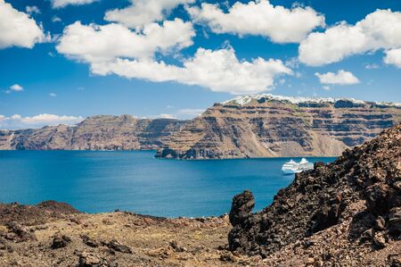 Sea view on the Greek Islands. The volcano near the island of Santoriniの写真素材