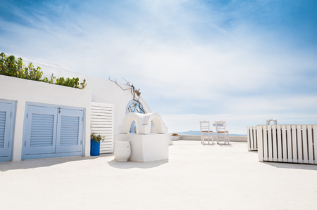 Luxury hotel with sea view. White architecture on Santorini island, Greece. Beautiful summer landscapeのeditorial素材