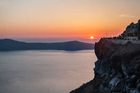 Beautiful sunset on Santorini island, Greece. Summer landscape with sea viewの写真素材