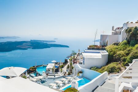 Luxury hotel with sea view. White architecture on Santorini island, Greece. Beautiful summer landscapeのeditorial素材