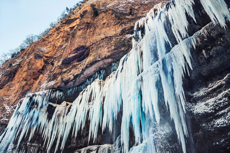Frozen waterfall. Beautiful winter landscapeの写真素材