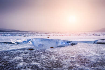 Beautiful winter landscape with ice and snow on the lakeの写真素材
