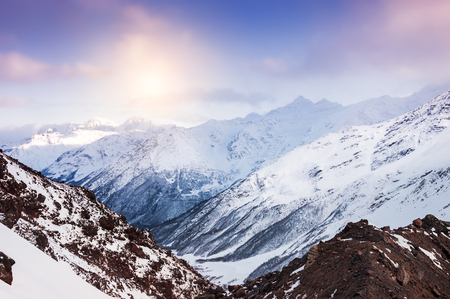 Winter mountains at sunset. Beautiful winter landscapeの写真素材