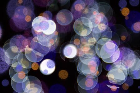 Shiny background with colorful lightsの写真素材