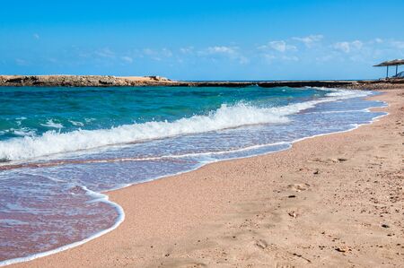 Tropical beach with blue sea. Beautiful summer landscape. Travel holiday backgroundの写真素材
