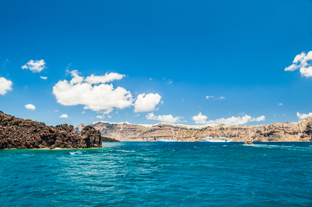 Beautiful view of the sea and islands. Blue sky and blue sea. Santorini island, Greece.の写真素材