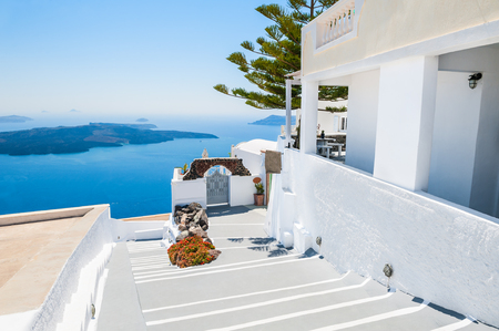 Luxury hotel with sea view. White architecture on Santorini island, Greece. Beautiful summer landscapeの写真素材