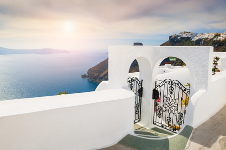 White architecture on Santorini island, Greece. Beautiful landscape with sea view at sunset.の写真素材