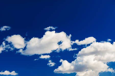 Beautiful dark blue sky with white clouds. Sky backgroundの写真素材