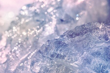 Winter ice. Abstract blurred background with bokehの写真素材