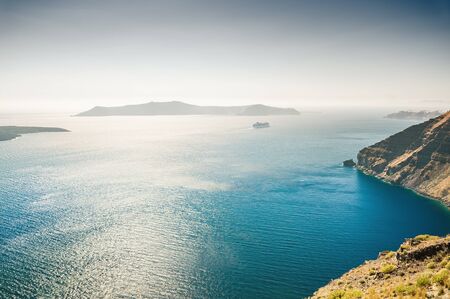 Beautiful view of the sea and islands. Santorini island, Greece.の写真素材
