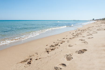 Beautiful tropical beach with turquoise water and white sand. Footprints on the sandy beachの写真素材