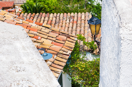 Old tiles on the roofs of houses. Beautiful street in Athens, Greece.の写真素材