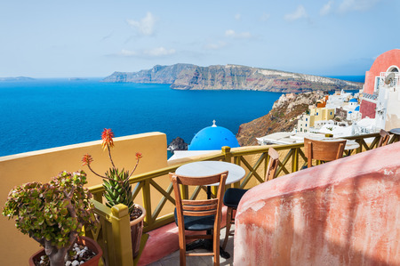 Beautiful terrace with sea view. Oia town, Santorini island, Greece.の写真素材