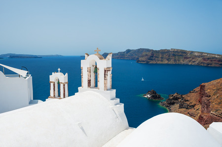 White church on Santorini island, Greece. Beautiful landscape with sea viewの写真素材