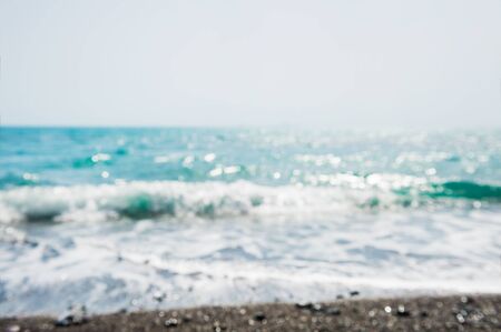 Blurred sea background. Tropical beach with turquoise water at sunlightの写真素材