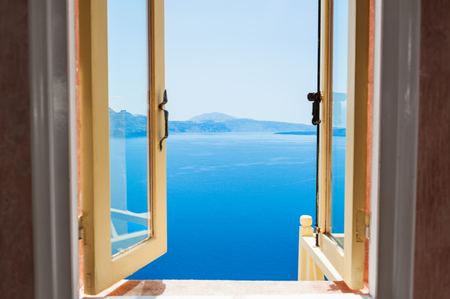 Open window with beautiful sea view. Santorini island, Greeceの写真素材