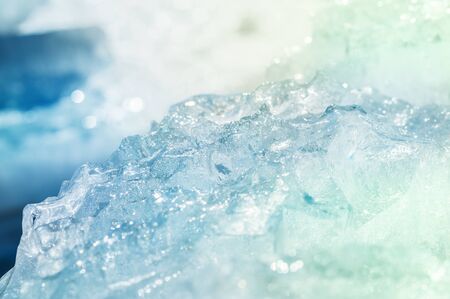 Blue ice on the frozen lake. Macro image with small depth of fieldの写真素材