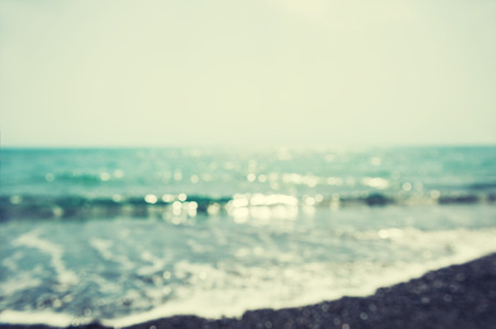 Beautiful tropical beach. Blurred sea background, vintage filterの写真素材