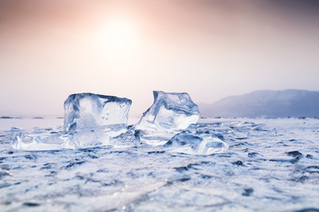 Icicle on the frozen lake. Macro image with small depth of field. Beautiful winter landscapeの写真素材