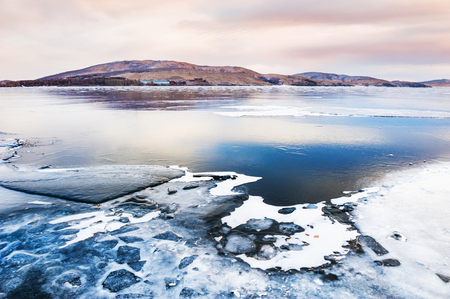 Ice on the frozen lake. Beautiful winter landscapeの写真素材