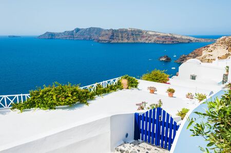 White architecture in Oia town on Santorini island, Greece. Beautiful landscape with sea viewの写真素材